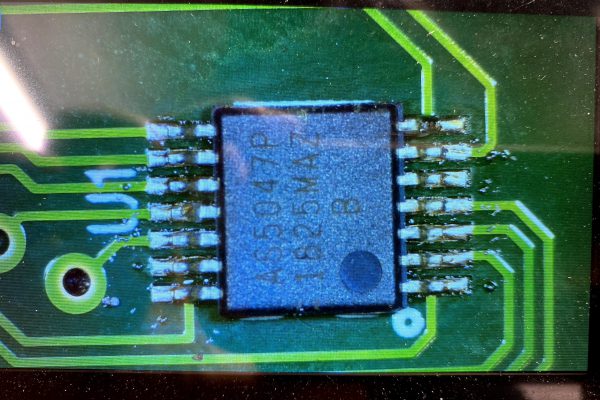 SMT installation of rotary encoder on professionally fabricated PCB.